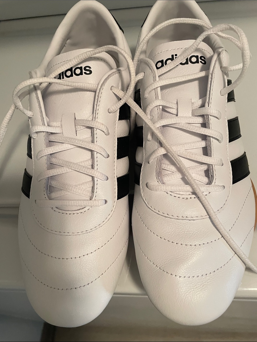 adidas White Sneakers with Black Three Stripes